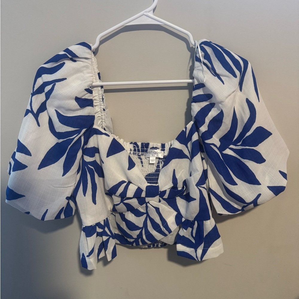 Super cute white and blue top!! Never worn!!